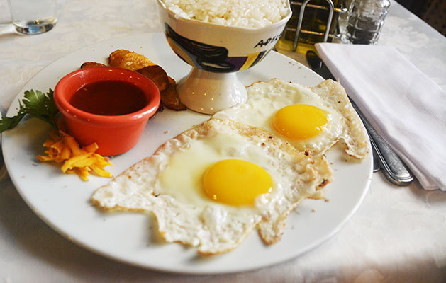 Beach Vacations in Cuba - fried eggs, beans and rice at a paladar in Havana